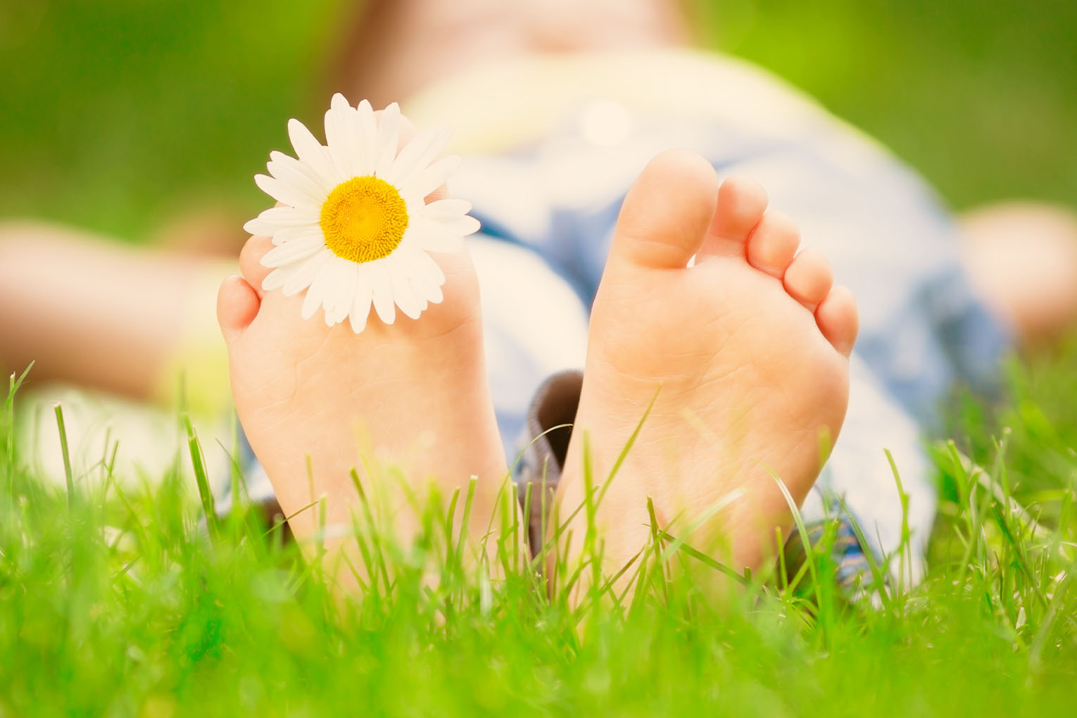 Portrait of anxious young woman sitting at desk in doctors office and waiting for doctor