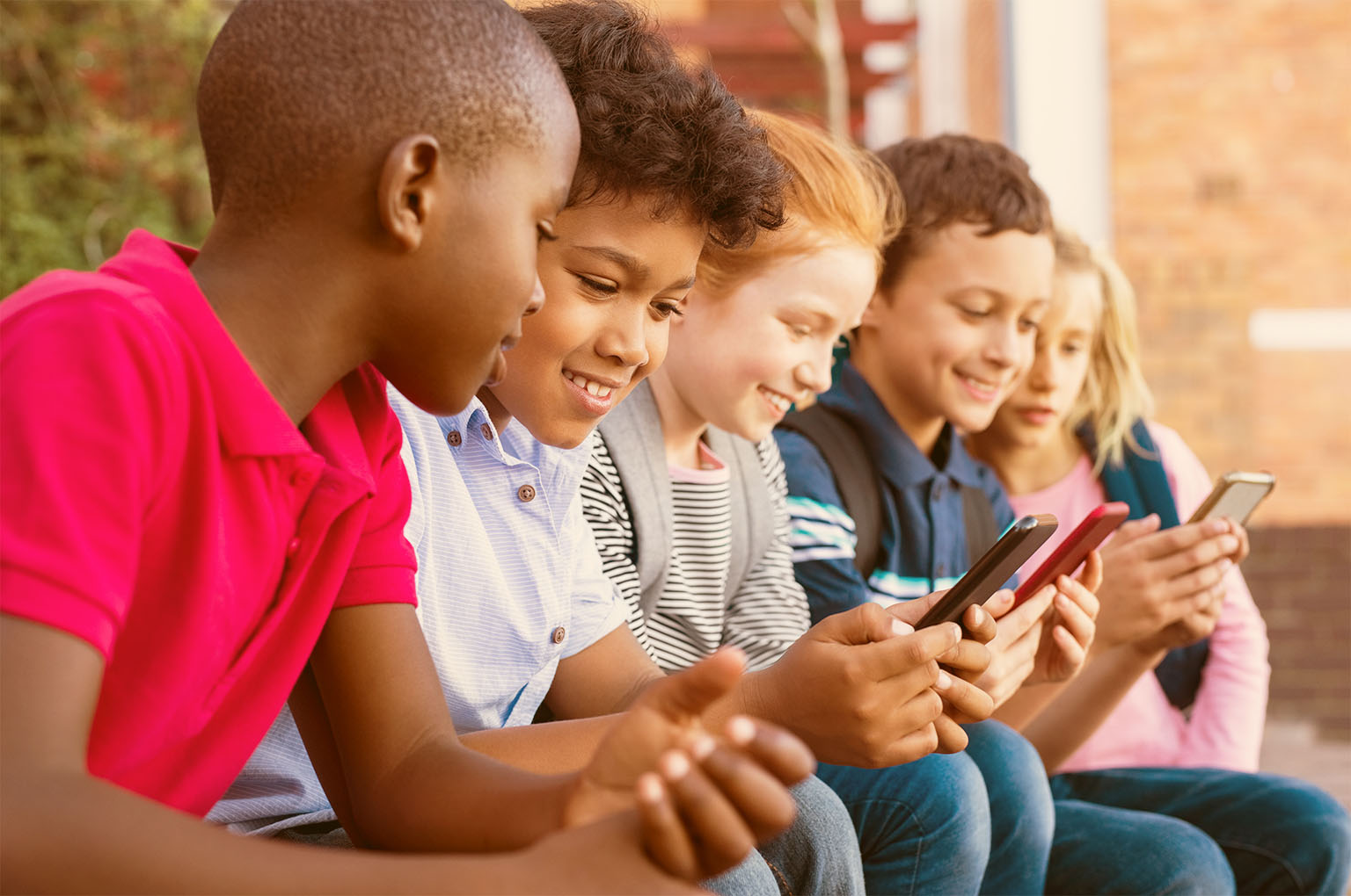 Portrait of anxious young woman sitting at desk in doctors office and waiting for doctor
