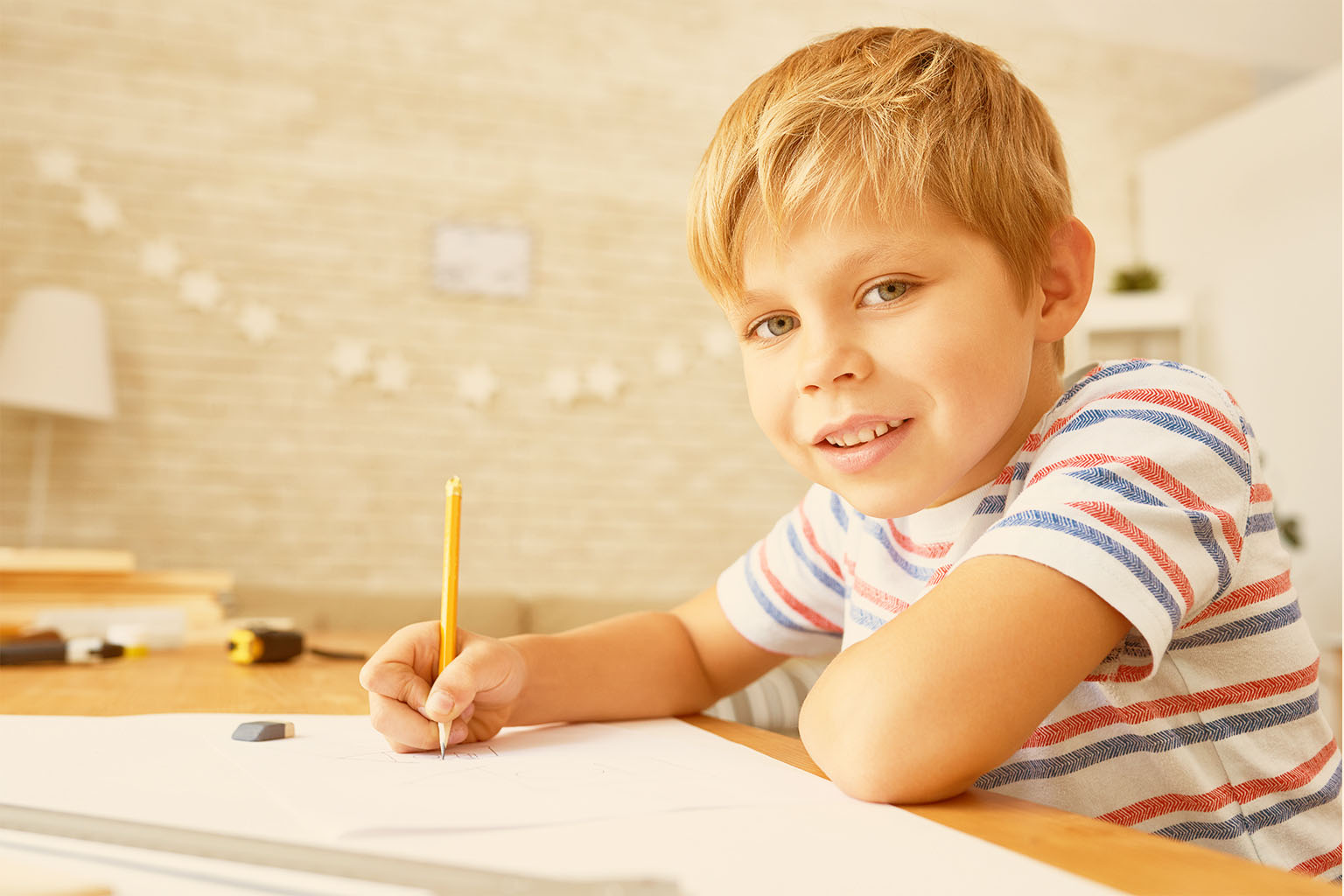 Portrait of anxious young woman sitting at desk in doctors office and waiting for doctor